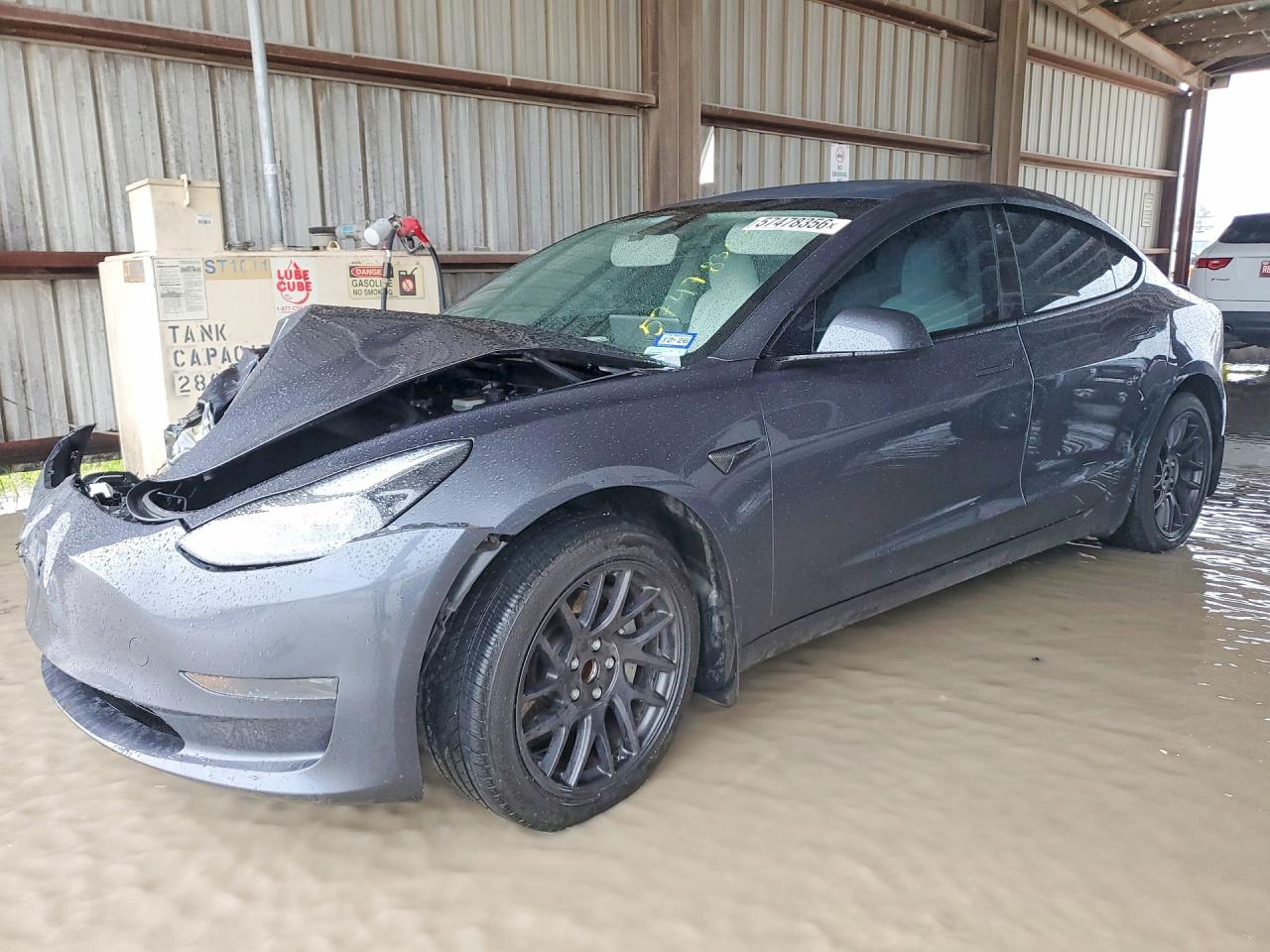 2023 Tesla Model 3, VIN 5YJ3E1EA1PF671615 — Front end