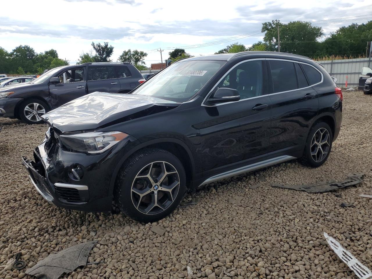 2018 BMW X1 xDrive28i, VIN WBXHT3C38J5L30980 — Front end