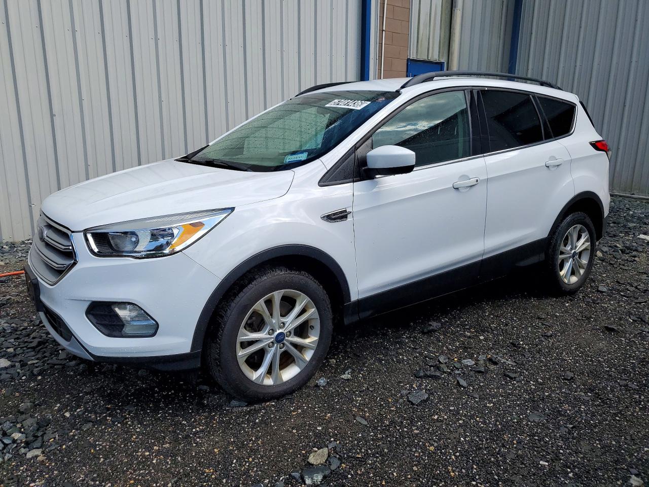 2018 Ford Escape SE, VIN 1FMCU9GD3JUD54227 — Side