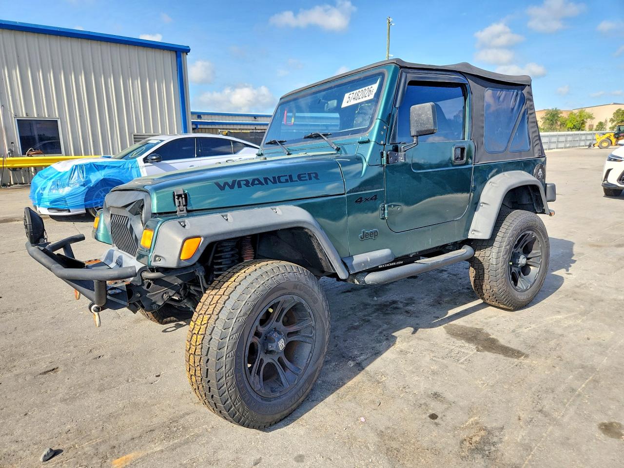 1999 Jeep Wrangler SE, VIN 1J4FY29P4XP460448 — Front end