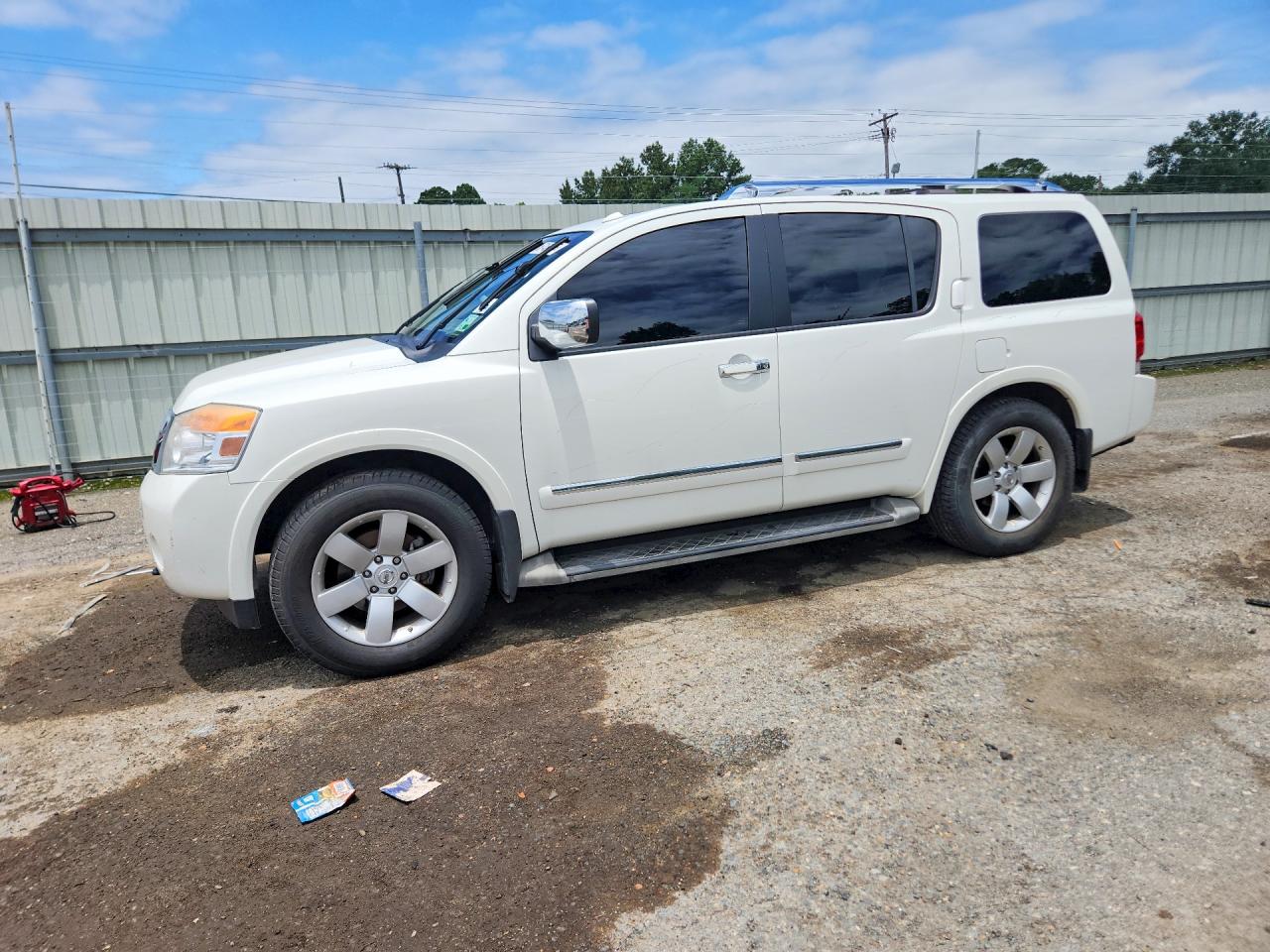 2011 Nissan Armada SL, VIN 5N1BA0NDXBN601144 — Мелкие вмятины и царапины