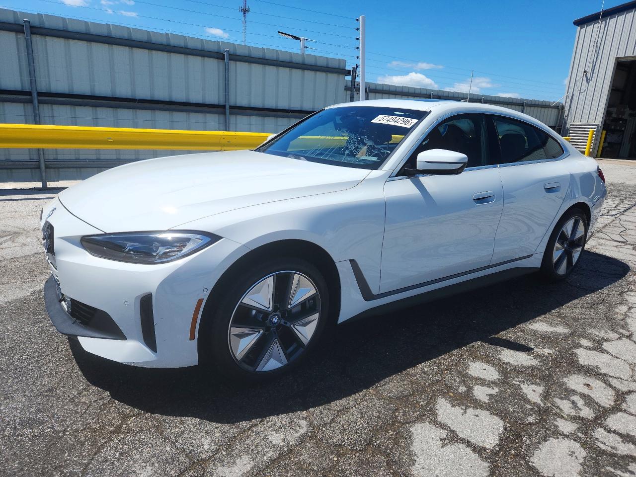 2024 BMW i4 eDrive40, VIN WBY73AW02RFS64252 — Side