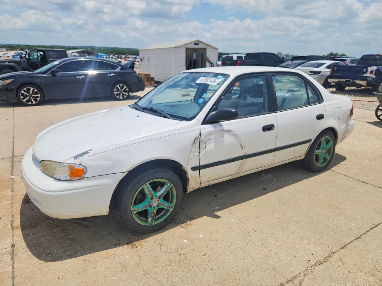 2002 Chevrolet Prizm Lsi, VIN 1Y1SK528X2Z404050 — Side