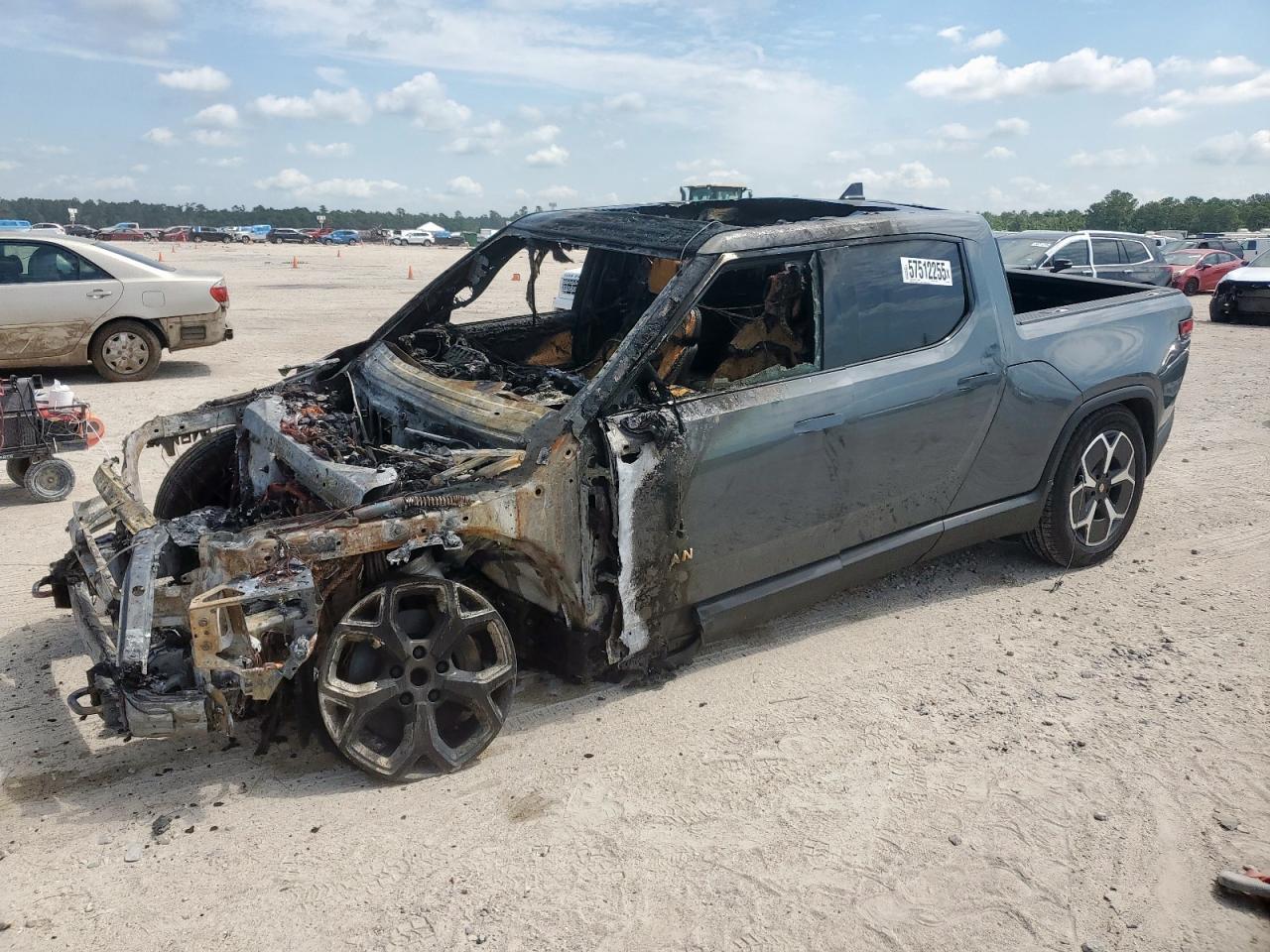 2022 Rivian R1T Adventure, VIN 7FCTGAAA7NN014892 — Burn