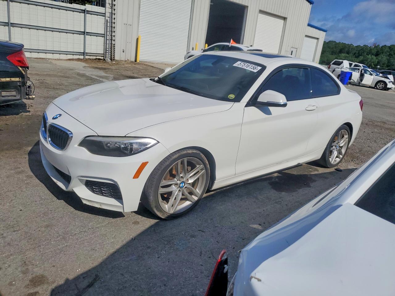 2015 BMW 2 Series 228i, VIN WBA1F5C53FV257492 — Water / flood
