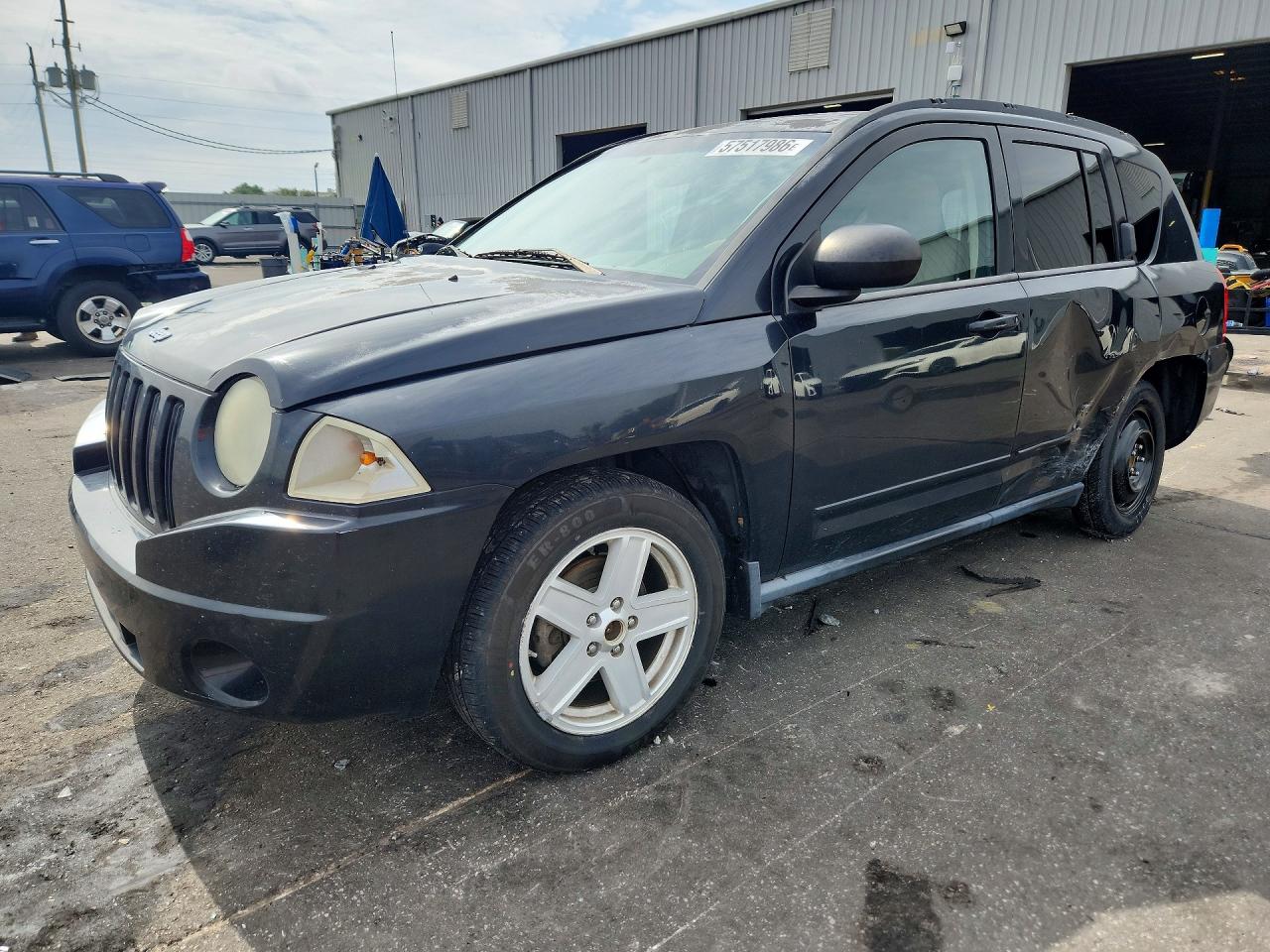 2010 Jeep Compass Sport, VIN 1J4NT4FAXAD531764 — Side