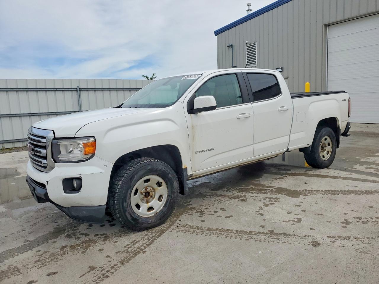 2015 GMC Canyon 4WD SLE, VIN 1GTG6BE32F1219671 — Normal wear