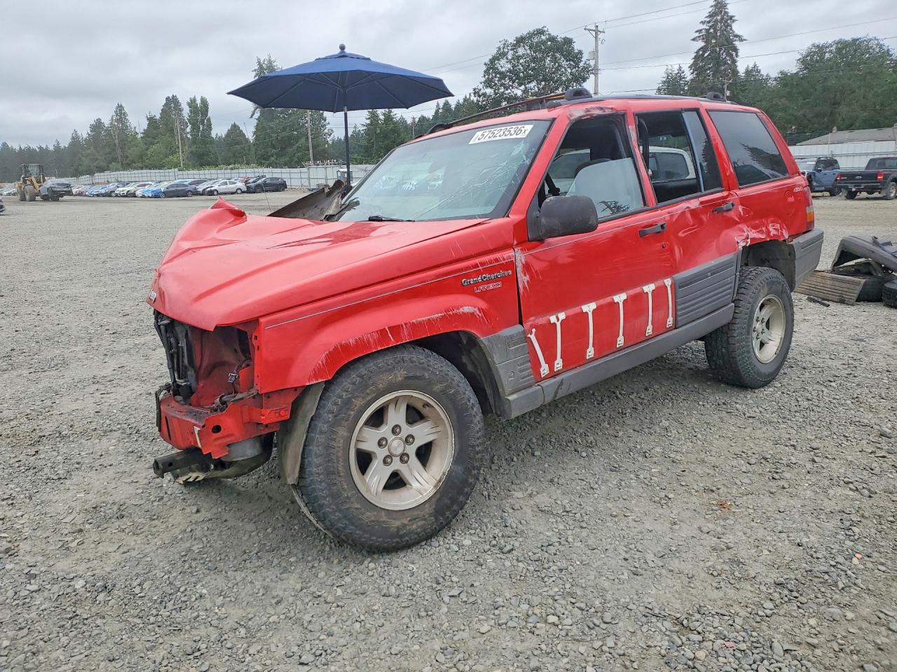 1995 Jeep Grand Cherokee Laredo, VIN 1J4GZ58S7SC576316 — Rollover