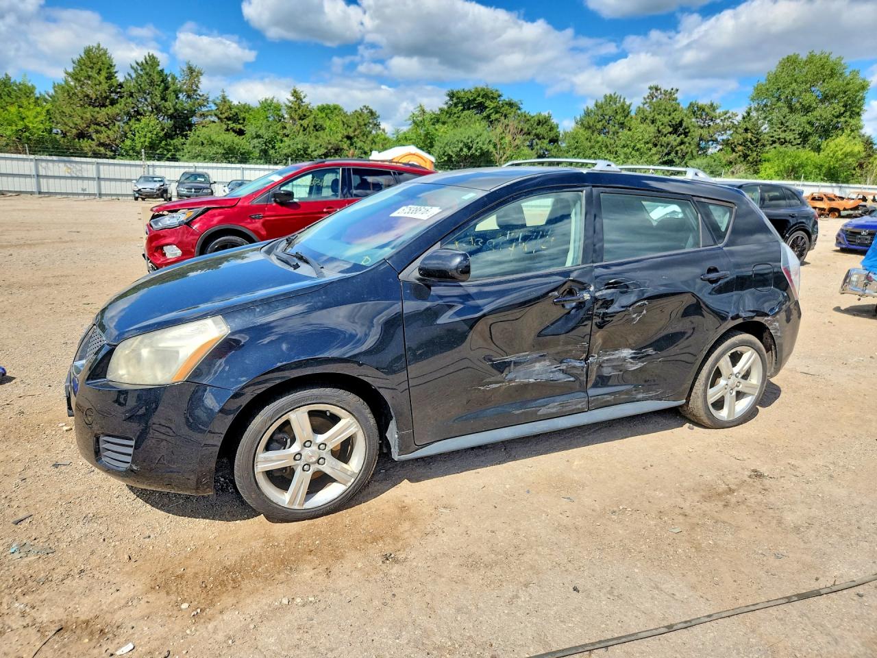 2010 Pontiac Vibe 1SB, VIN 5Y2SP6E08AZ417430 — Side