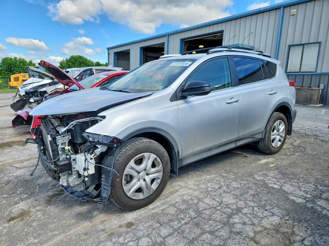 2014 Toyota RAV4 LE, VIN JTMBFREV7EJ007237 — Front end