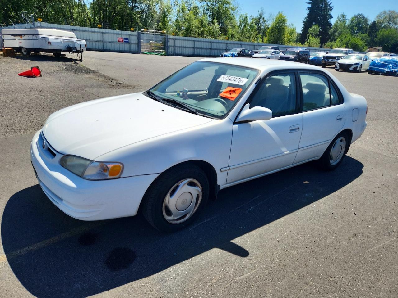 1998 Toyota Corolla VE, VIN 1NXBR12E1WZ085201 — Side