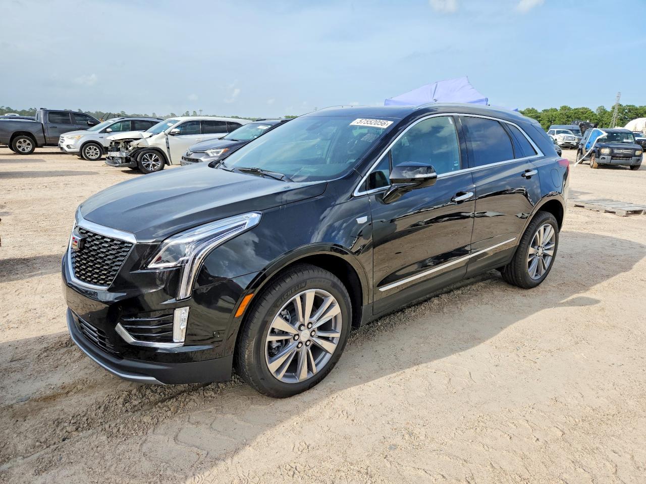 2026 Cadillac XT5 FWD Premium Luxury, VIN 1GYKNCRS4TZ110804 — Minor dents and scratches