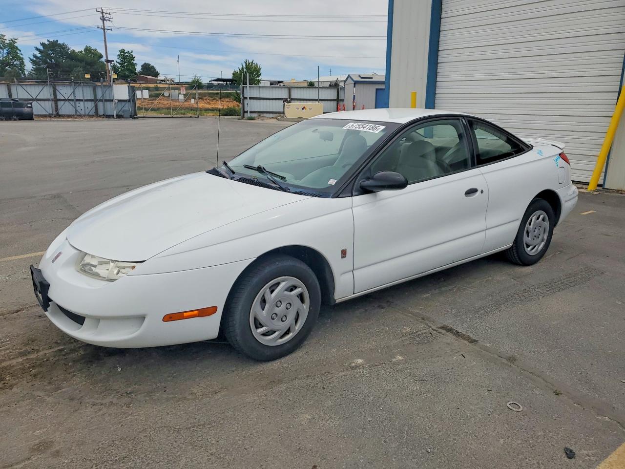 1998 Saturn SC, VIN 1G8ZE1288WZ315547 — Зад
