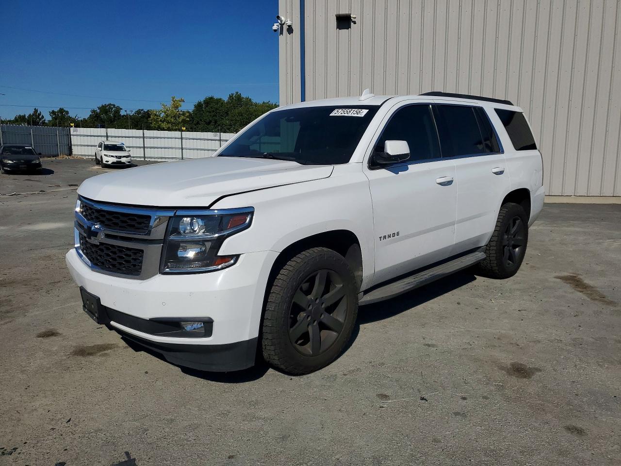 2016 Chevrolet Tahoe LT, VIN 1GNSKBKC9GR462561 — Front end