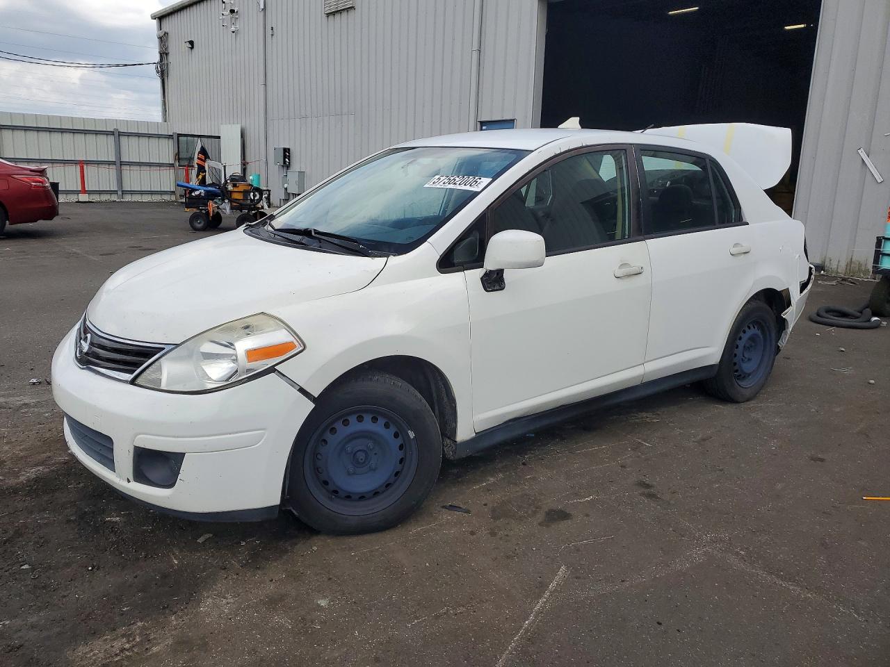 2011 Nissan Versa S, VIN 3N1BC1AP2BL463705 — Rear end