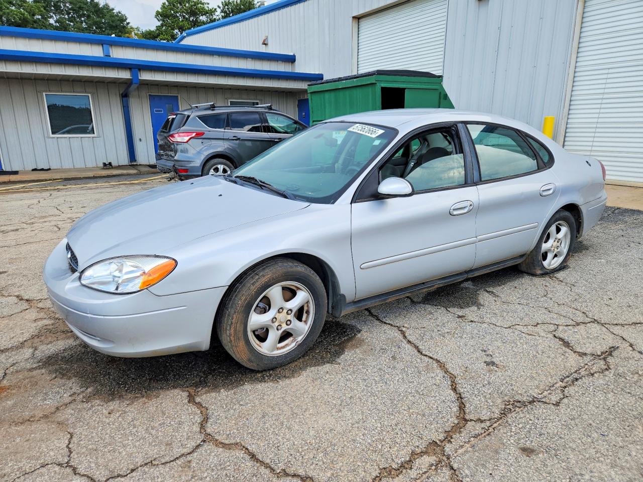 2003 Ford Taurus SES Standard, VIN 1FAFP55203G164671 — Minor dents and scratches