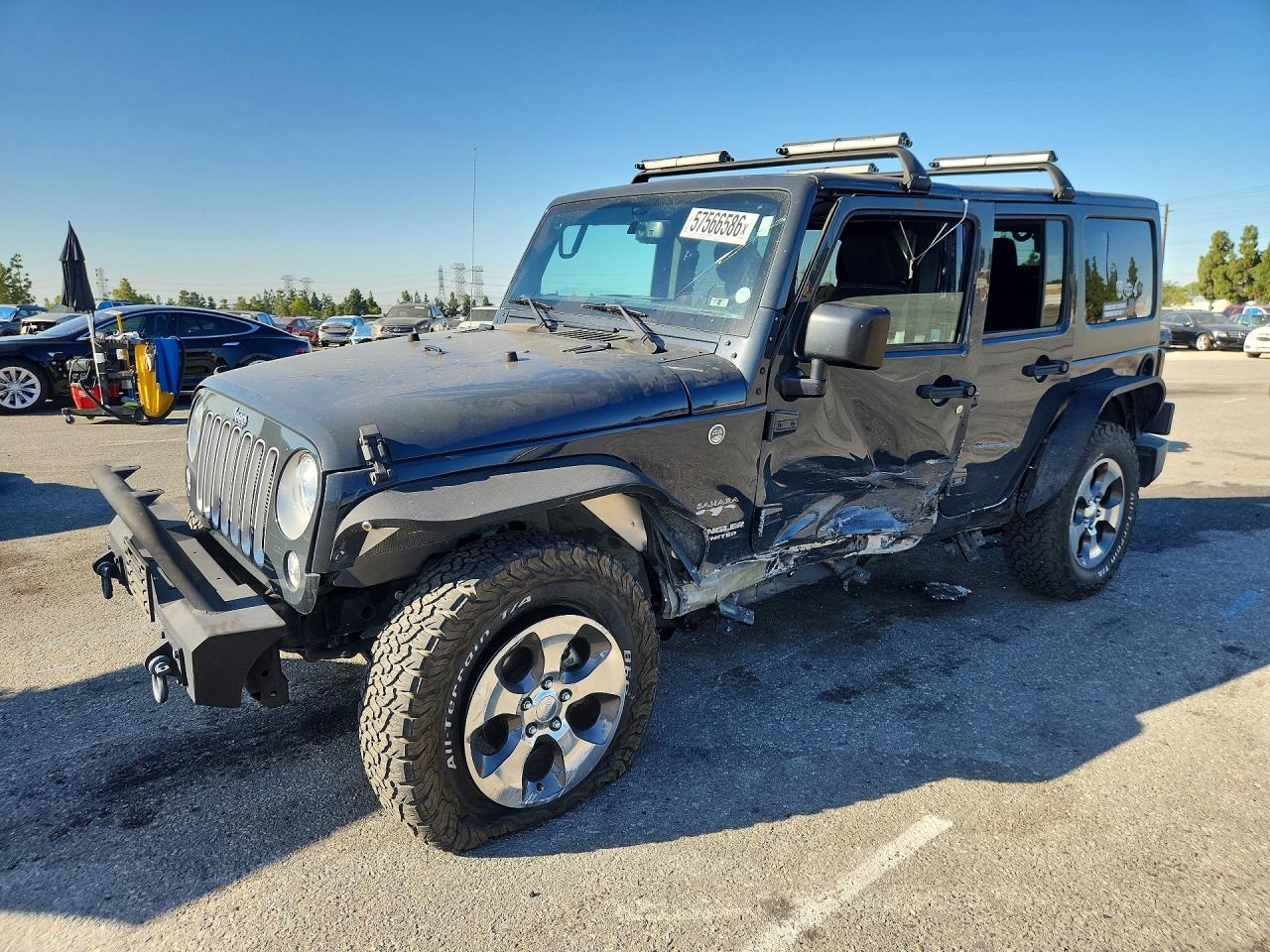 2017 Jeep Wrangler Unlimited Sahara, VIN 1C4BJWEG9HL573200 — Side