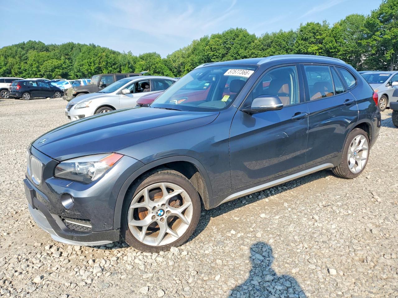2015 BMW X1 xDrive28i, VIN WBAVL1C52FVY36234 — Minor dents and scratches
