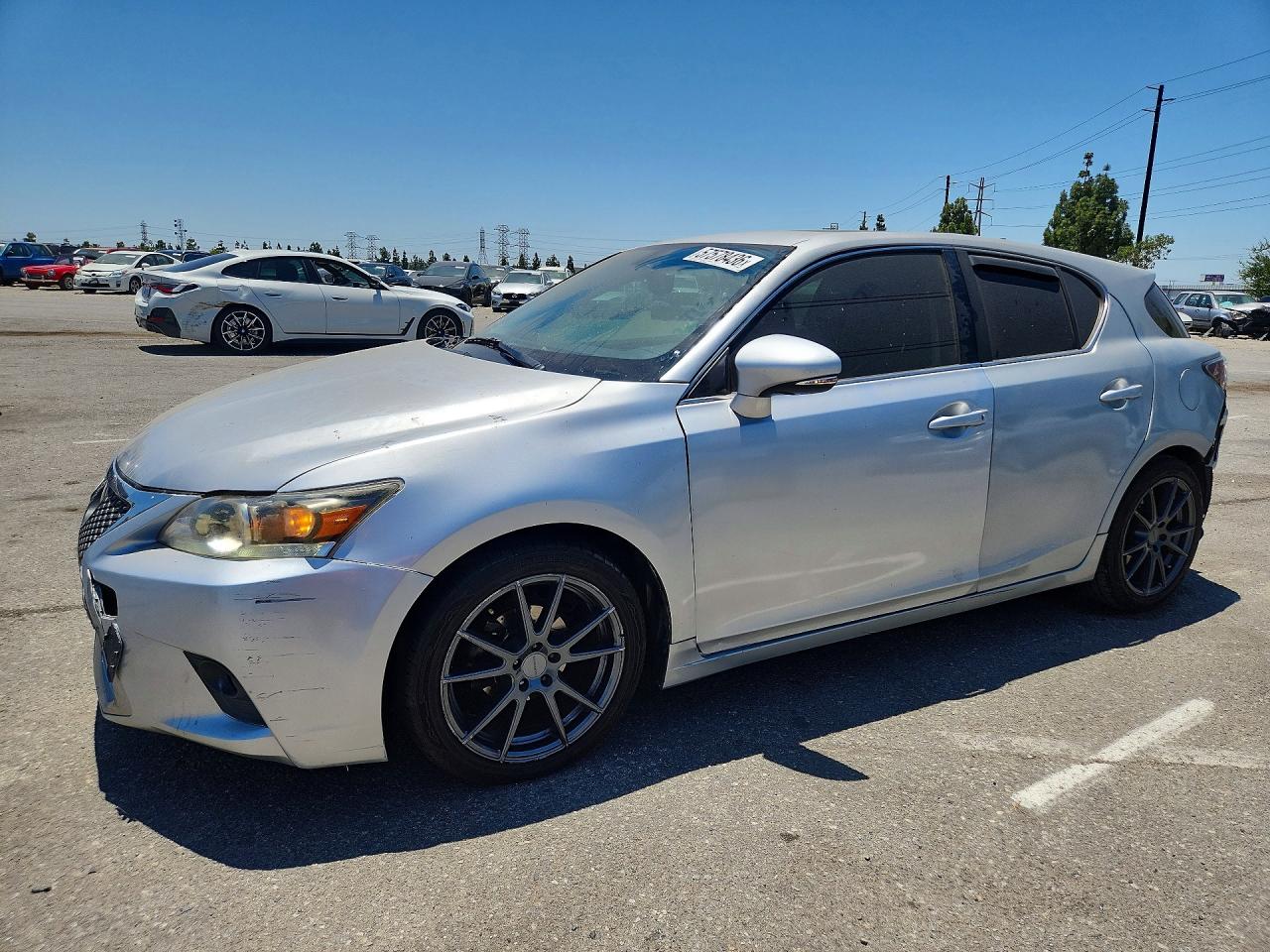 2016 Lexus CT 200h, VIN JTHKD5BH2G2271393 — Side