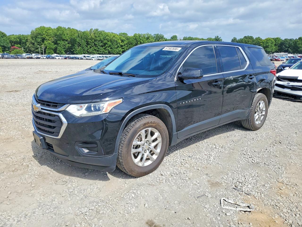 2018 Chevrolet Traverse LS, VIN 1GNERFKW0JJ217972 — Rear end
