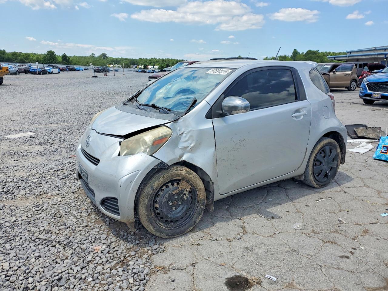 2012 Scion iQ, VIN JTNJJXB01CJ015625 — Side
