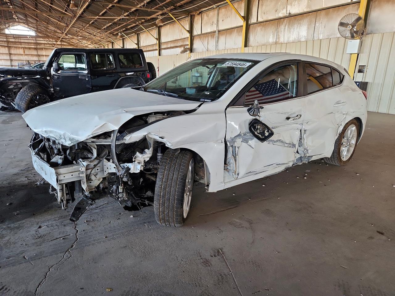 2014 Mazda 3 S Touring, VIN JM1BM1L31E1136289 — Side