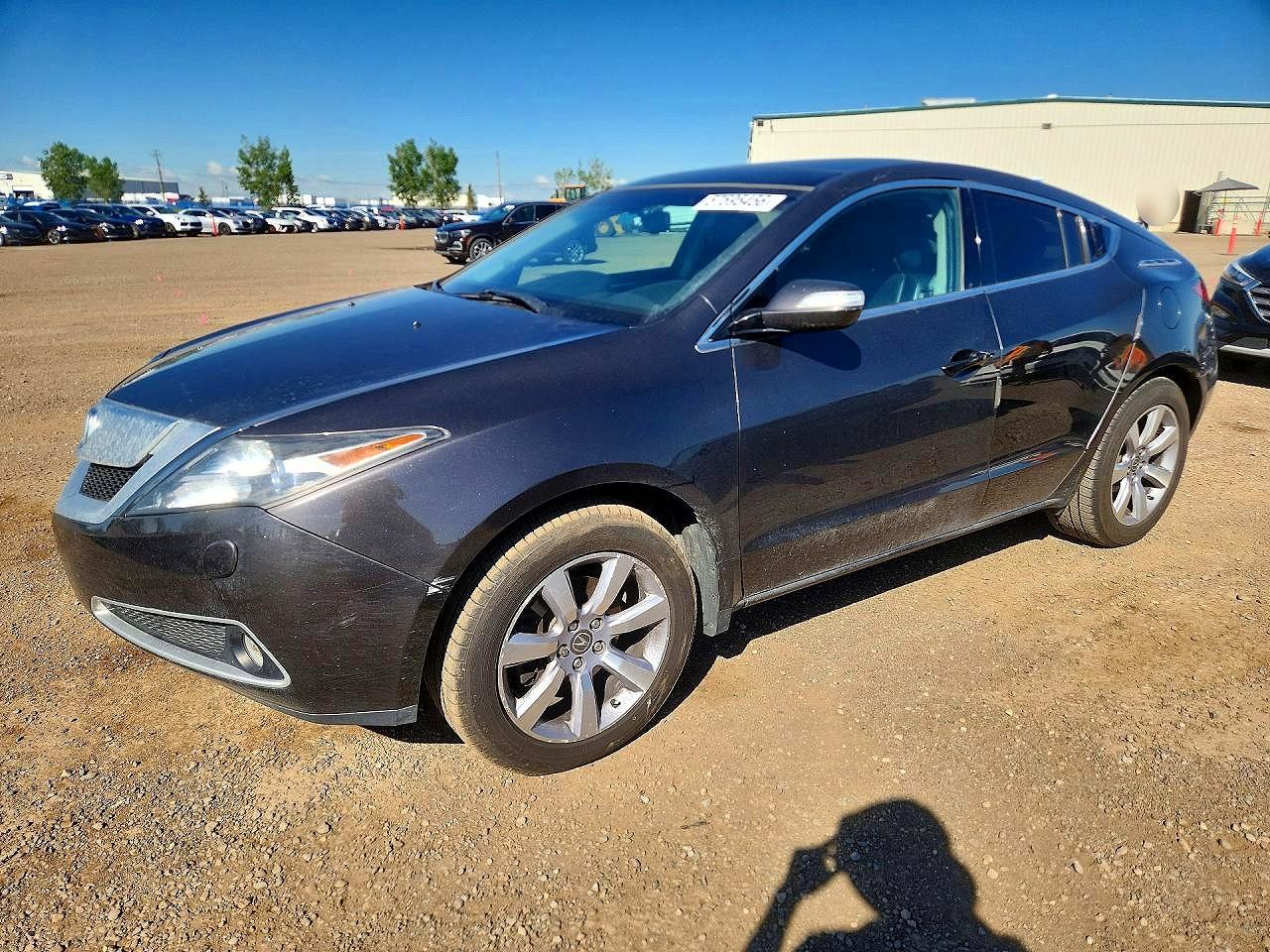 2011 Acura ZDX Technology, VIN 2HNYB1H45BH000031 — Side