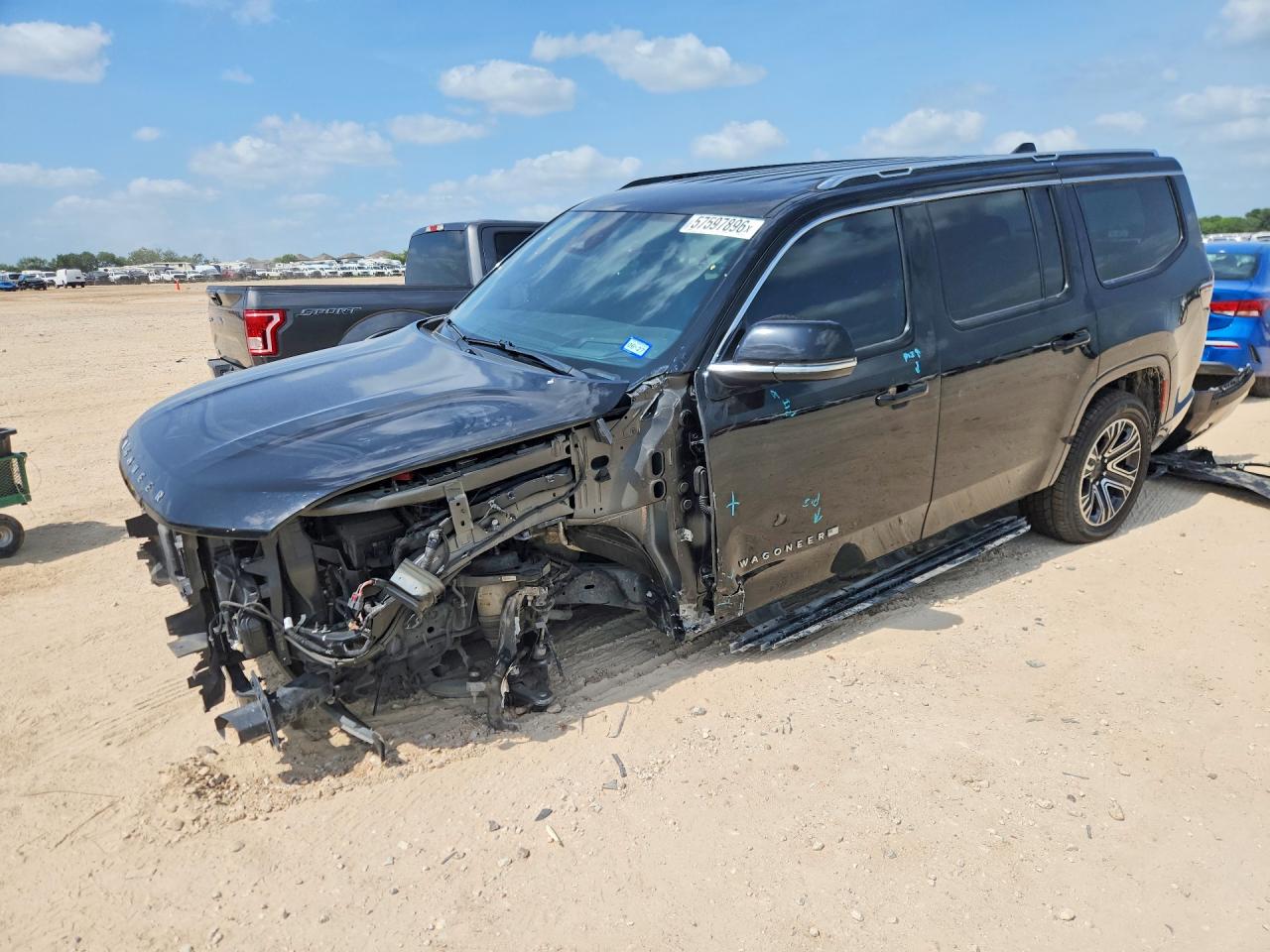 2022 Jeep Wagoneer Series III, VIN 1C4SJVDT6NS142632 — Undercarriage