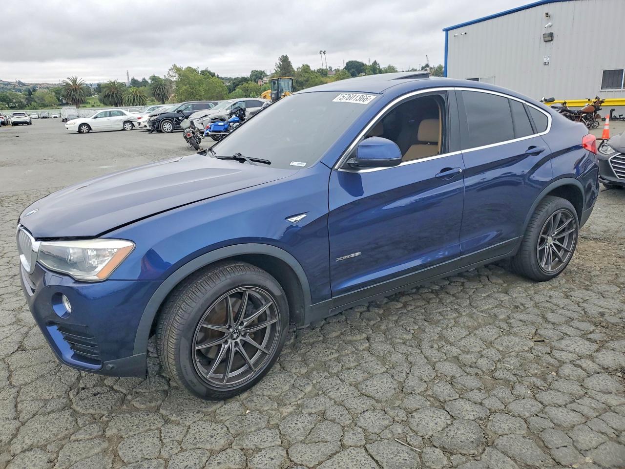 2015 BMW X4 xDrive35i, VIN 5UXXW5C50F0E87907 — Minor dents and scratches