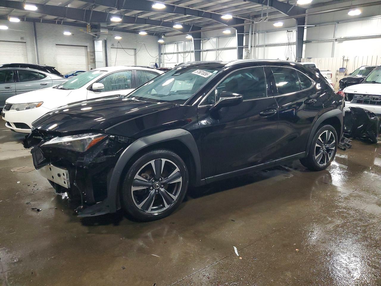 2025 Lexus UX 300h Premium, VIN JTHUCJDH6S2000377 — Side