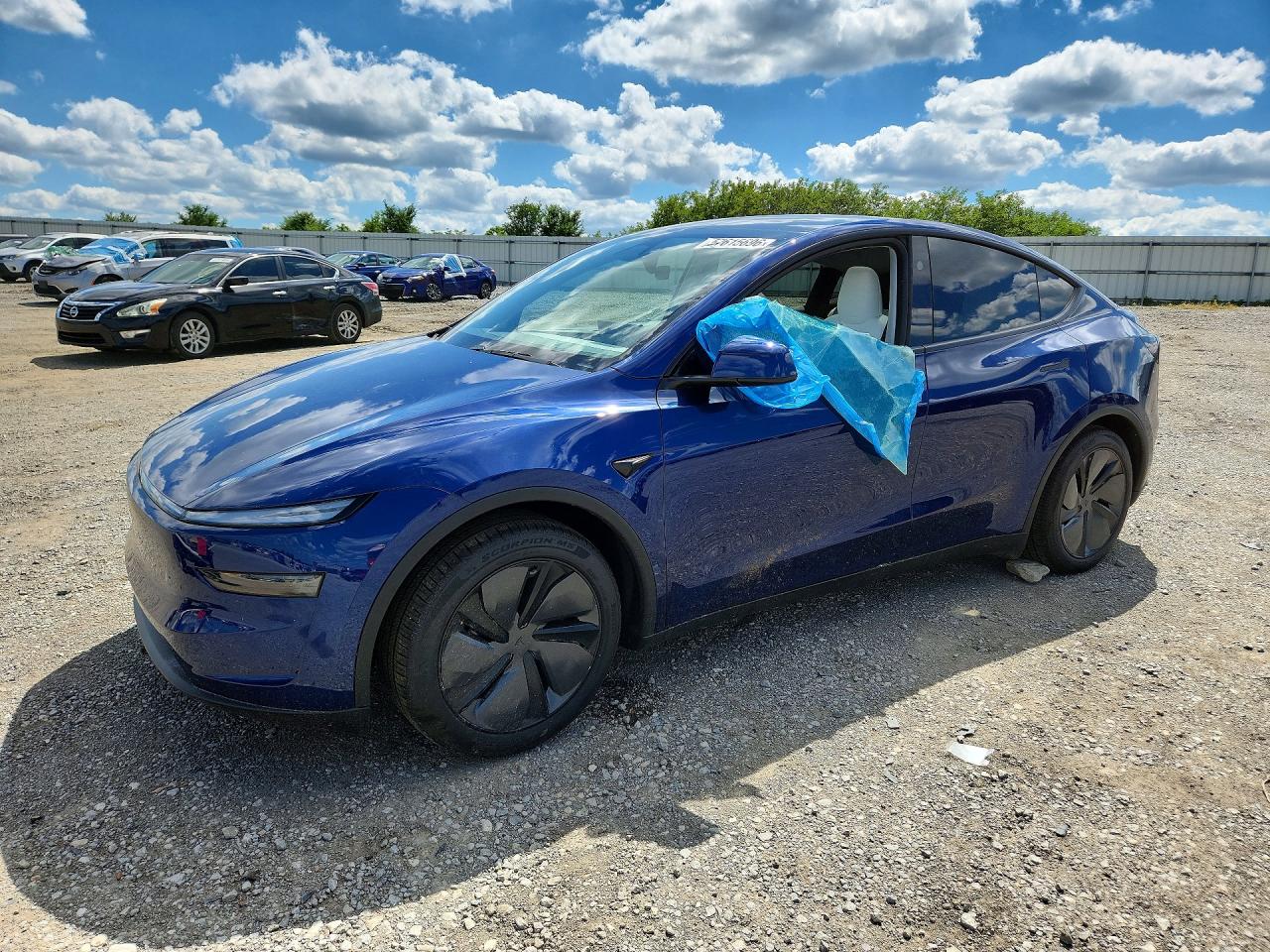 2026 Tesla Model Y Long Range, VIN 7SAYGDED1TA588787 — Water / flood