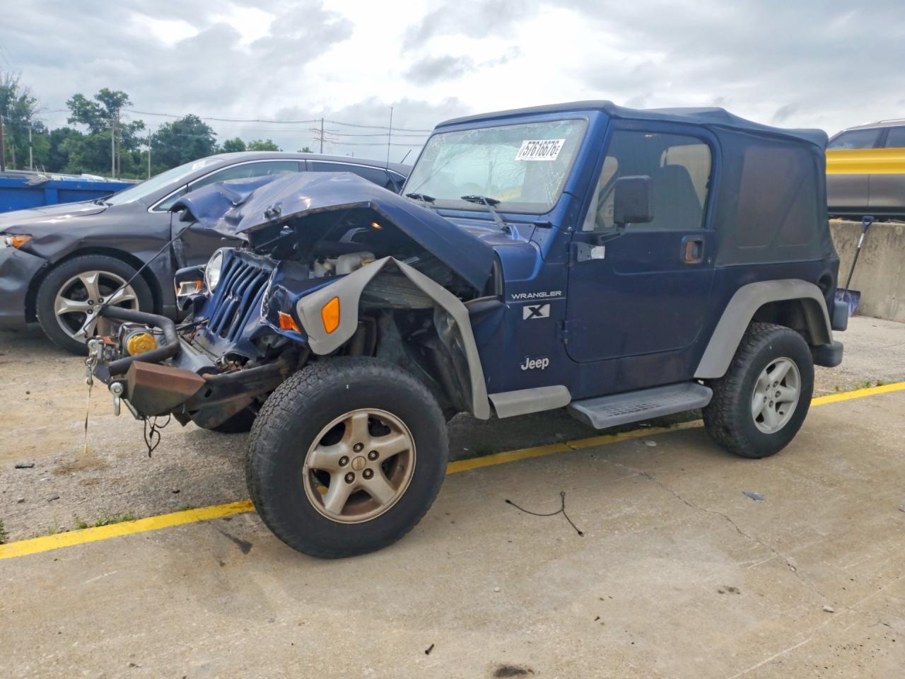 1999 Jeep Wrangler, VIN 1J4FA39F72P708301 — Front end