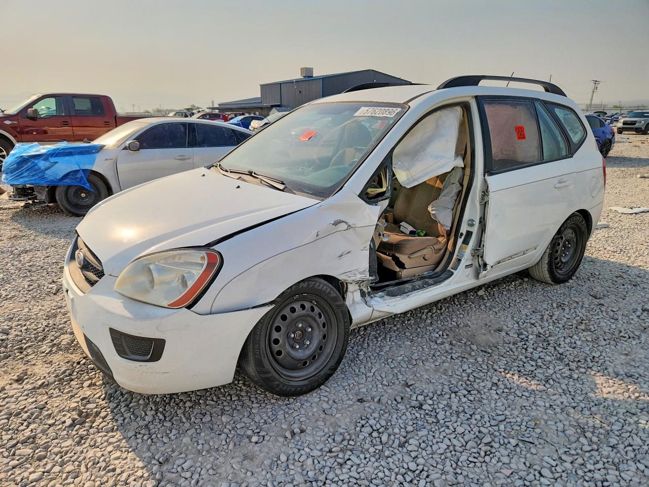 2009 Kia Rondo LX, VIN KNAFG529797279625 — Бок