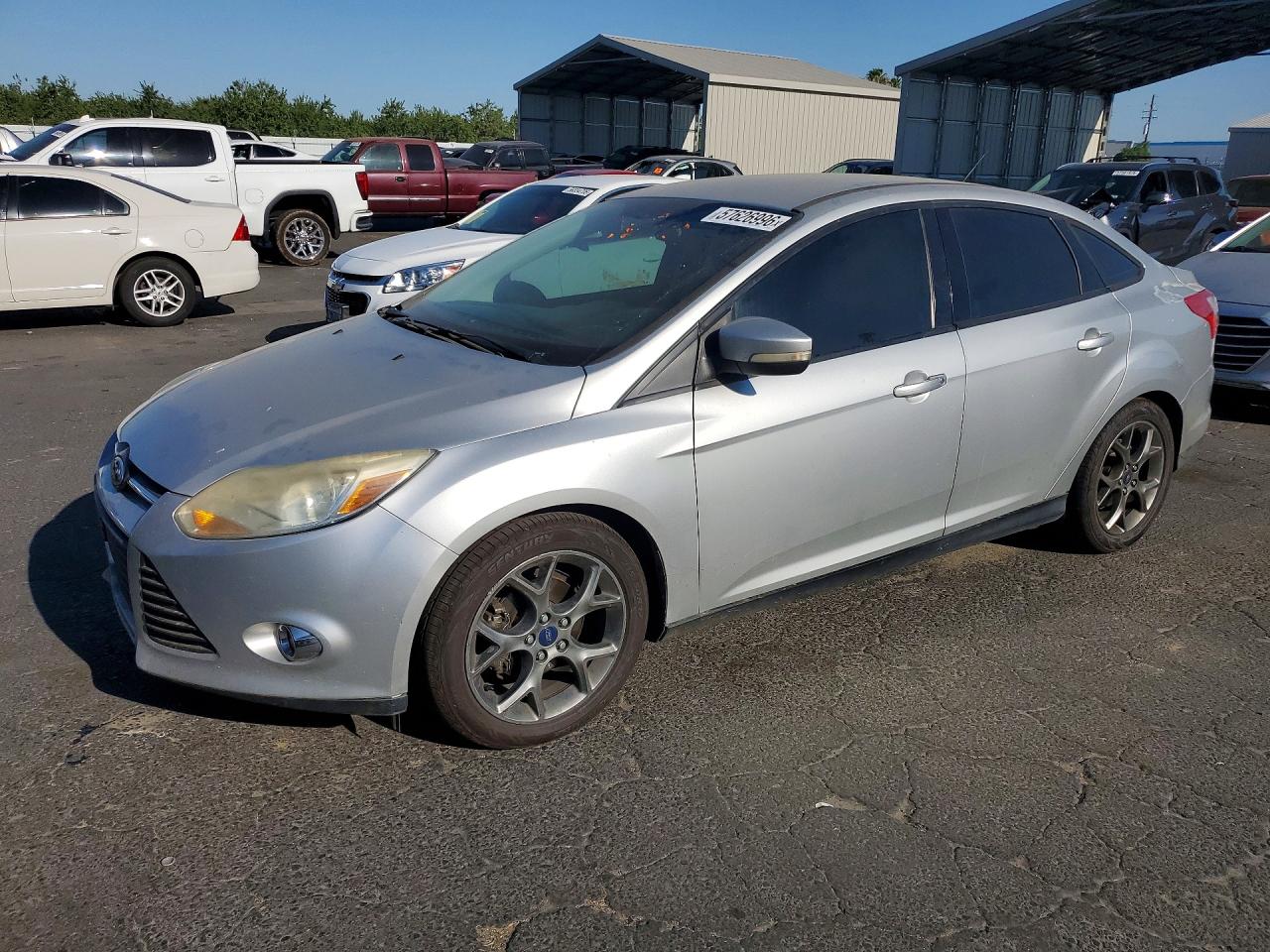 2014 Ford Focus SE, VIN 1FADP3F21EL266968 — Prior damage history