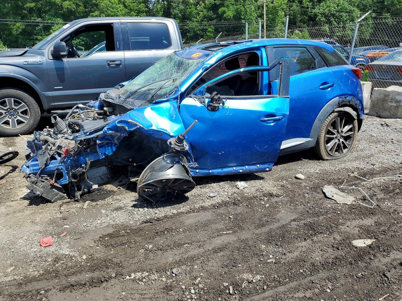 2016 Mazda CX-3 Grand Touring, VIN JM1DKBD77G0104767 — Rollover