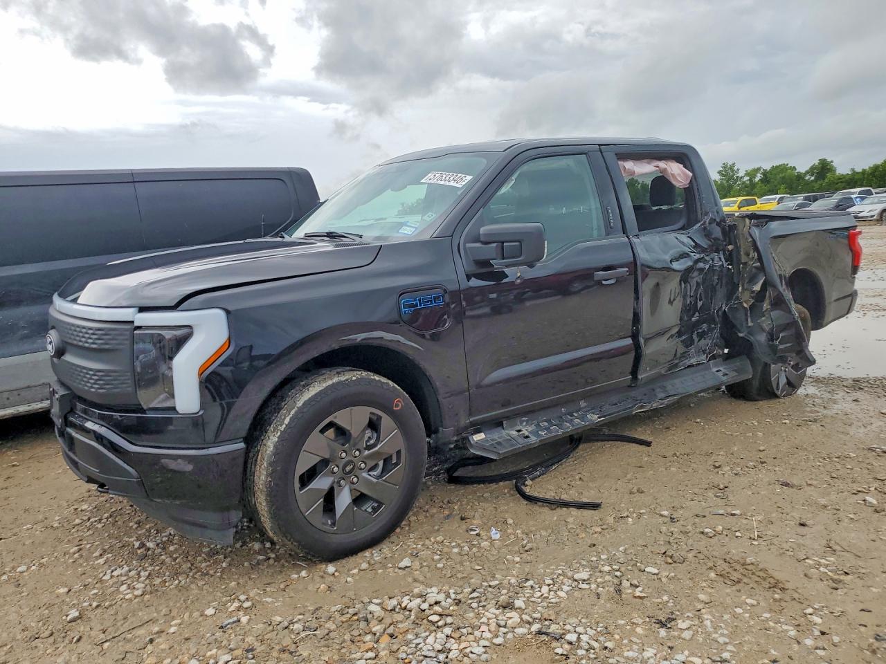 2024 Ford F-150 Lightning XLT, VIN 1FTVW3LK1RWG21504 — Side