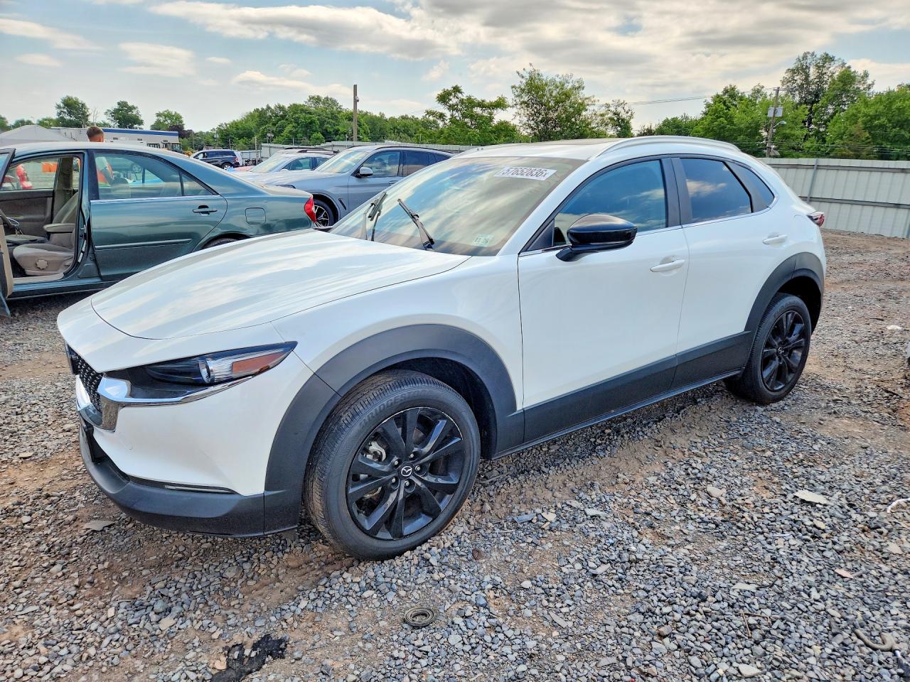 2021 Mazda CX-30 Turbo, VIN 3MVDMBAY7MM311092 — Rear end