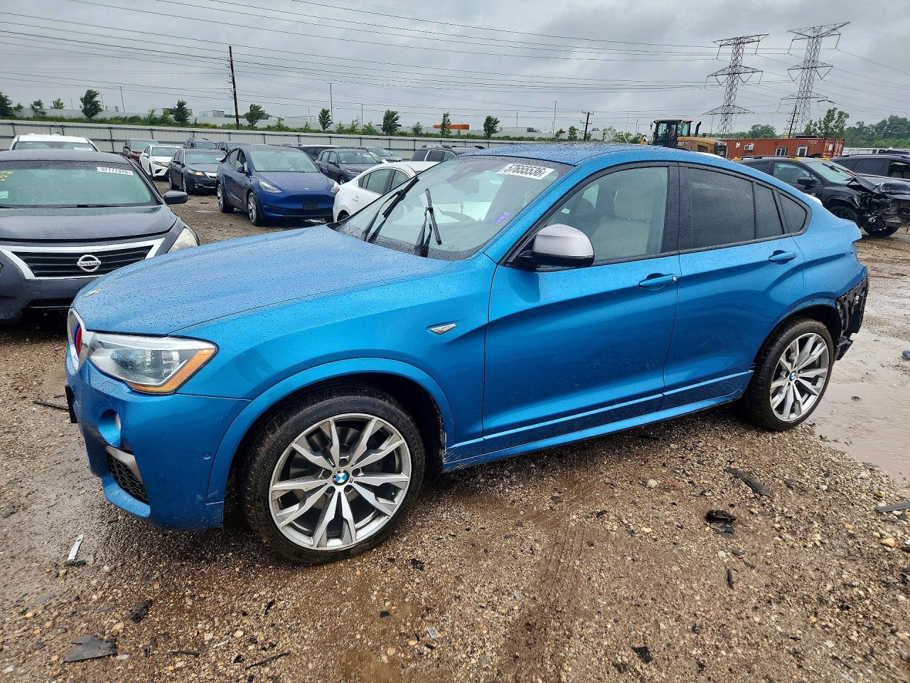 2017 BMW X4 M40i, VIN 5UXXW7C31H0U26561 — Rear end