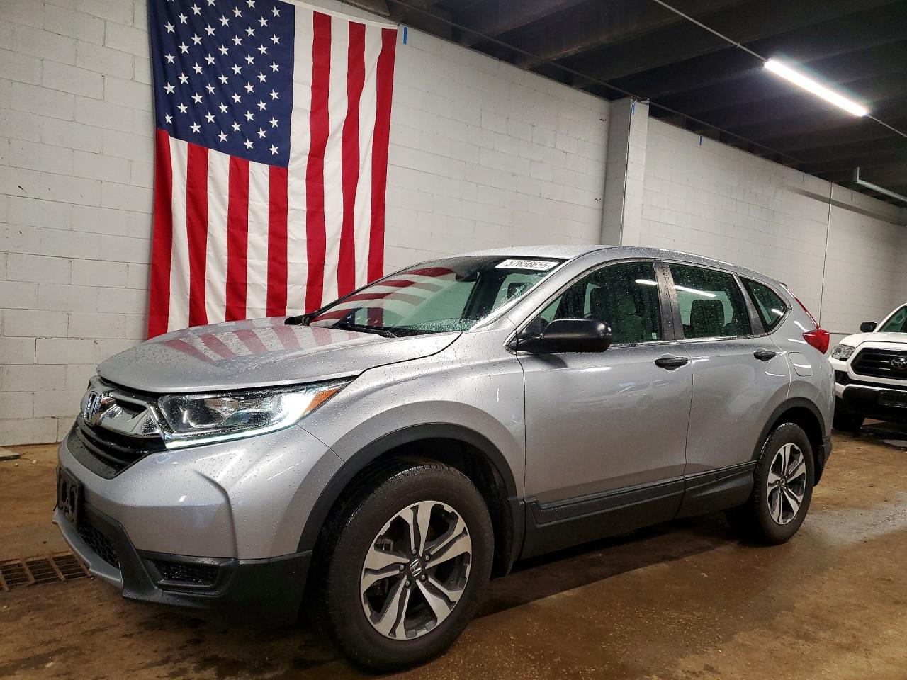 2018 Honda CR-V LX, VIN 5J6RW6H30JL000498 — Hail