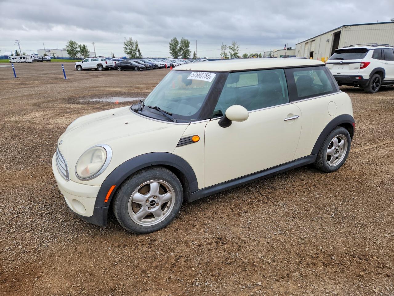 2009 MINI Hardtop, VIN WMWMF33529TU74906 — Перед