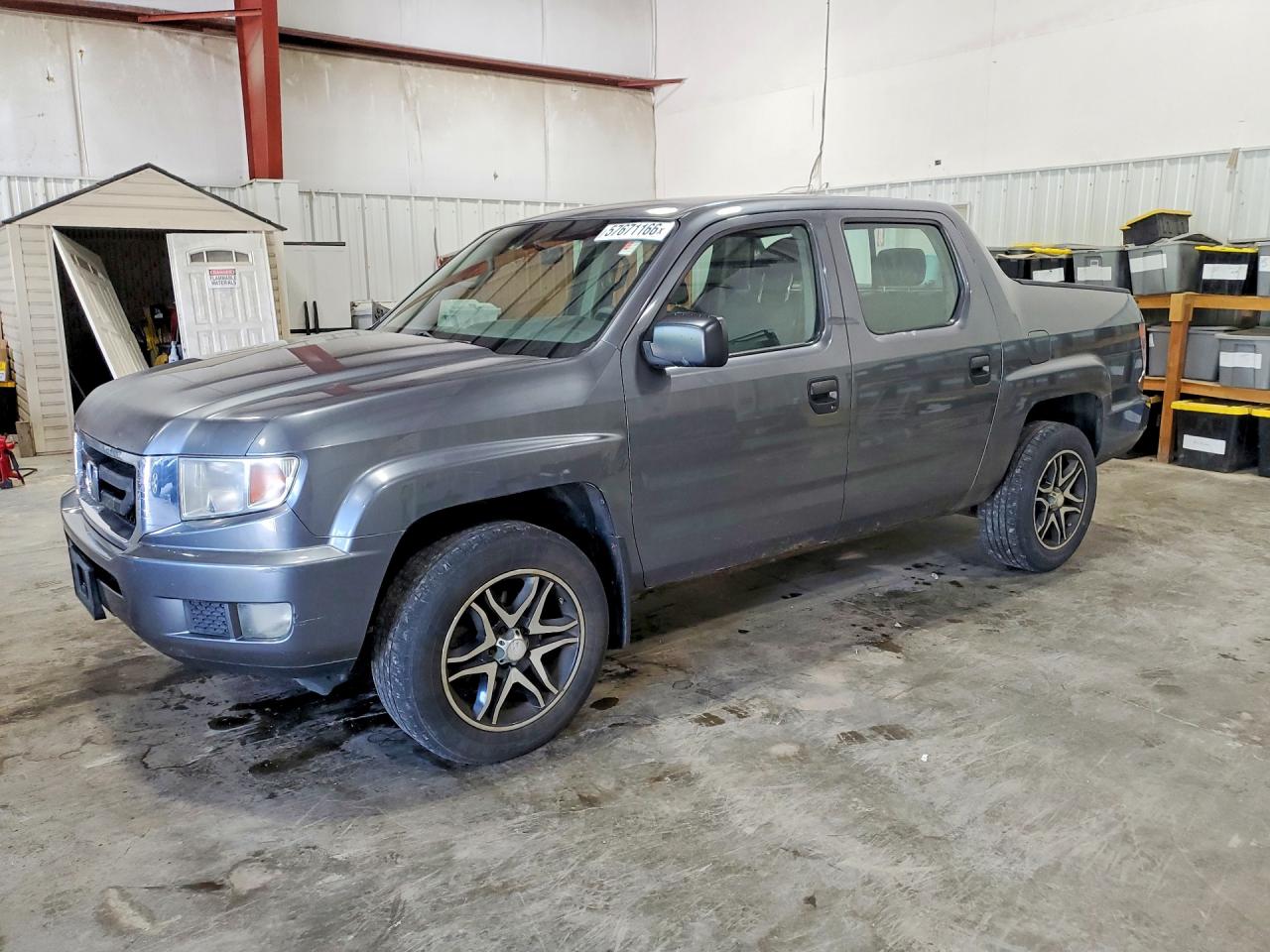 2011 Honda Ridgeline RT, VIN 5FPYK1F28BB003218 — Normal wear