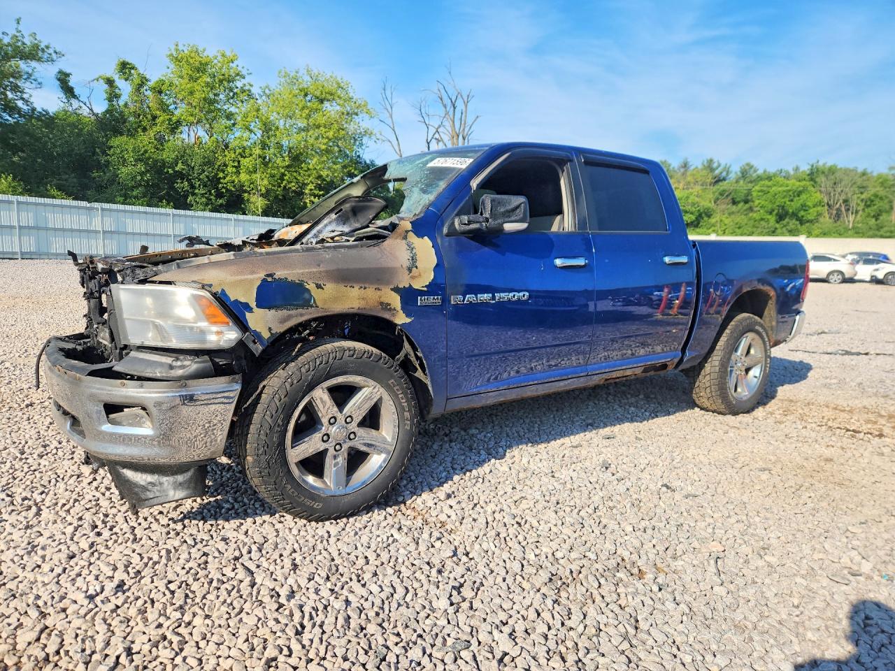 2011 Ram 1500 Laramie, VIN 1D7RV1CT2BS557283 — Engine fire