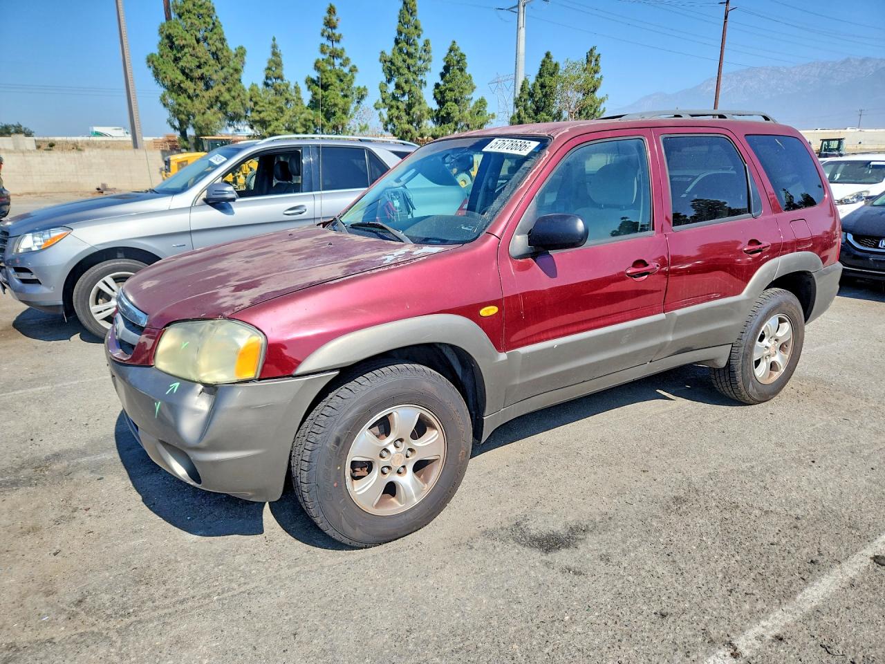 2003 Mazda Tribute LX, VIN 4F2CZ04183KM29305 — Minor dents and scratches