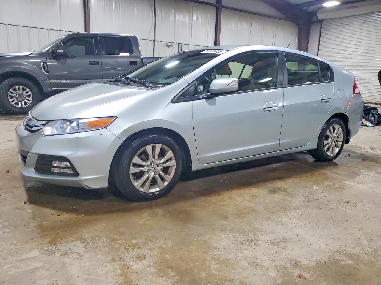 2013 Honda Insight EX, VIN JHMZE2H76DS004214 — Side