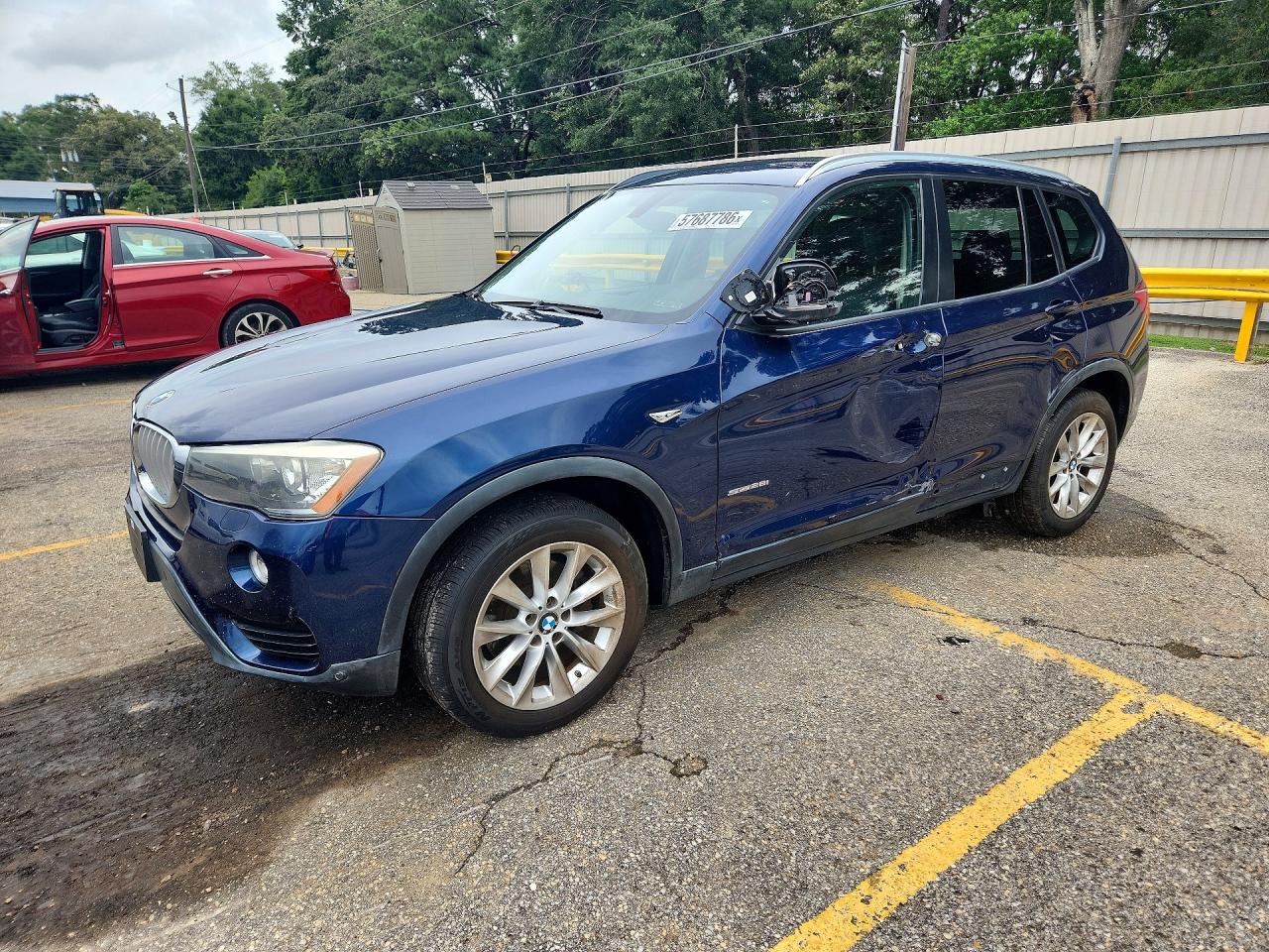2017 BMW X3 sDrive28i, VIN 5UXWZ7C30H0V94095 — Side