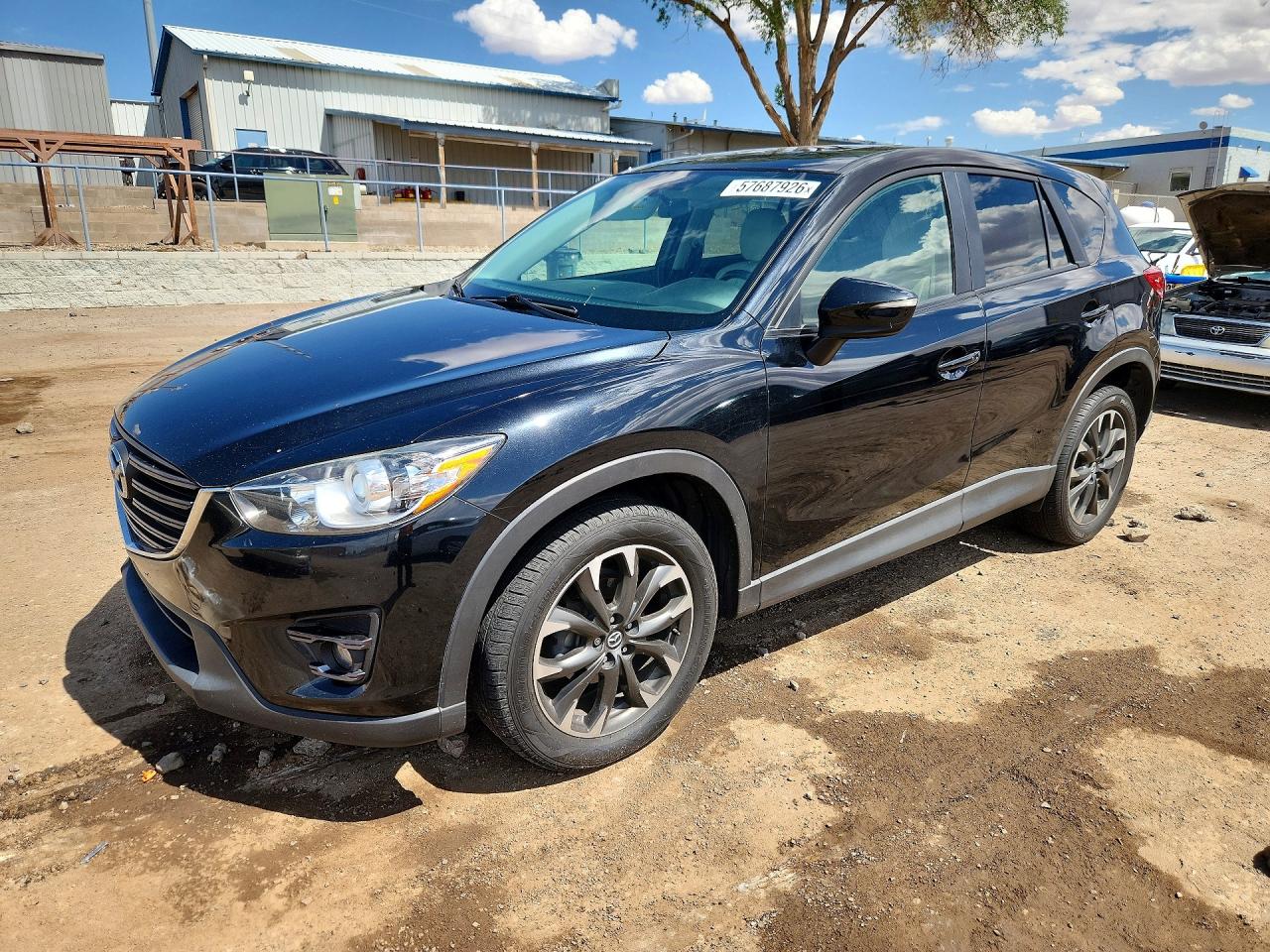 2016 Mazda CX-5 Grand Touring, VIN JM3KE4DY1G0748730 — Фото с аукциона 1 of 4