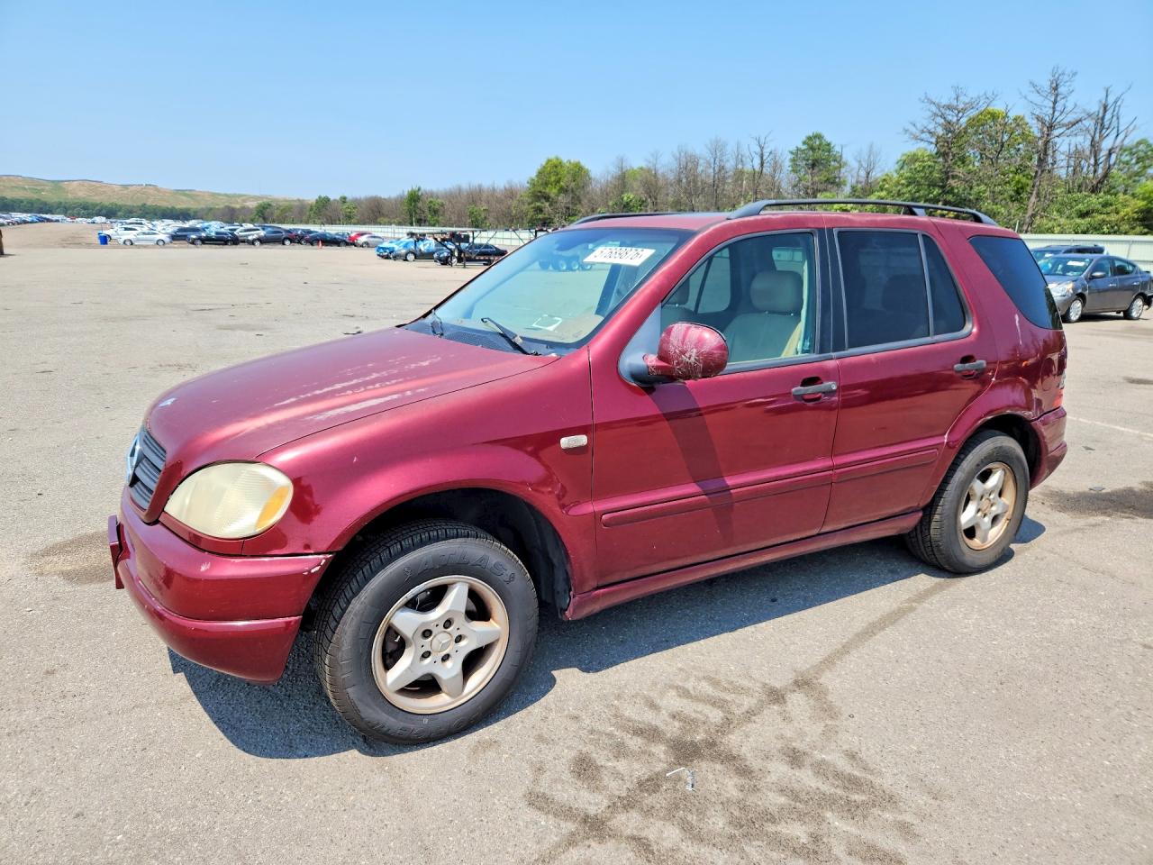 2001 Mercedes-Benz M 320/430/500, VIN 4JGAB54E71A249243 — Side