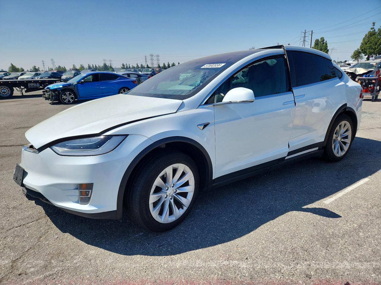 2020 Tesla Model X Long Range, VIN 5YJXCAE21LF249953 — Front end