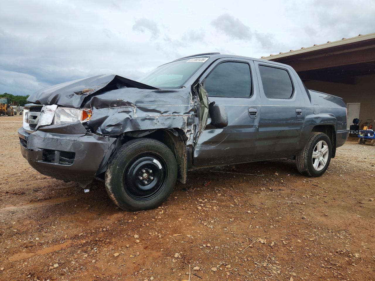 2010 Honda Ridgeline RTL, VIN 5FPYK1F53AB005385 — Front end