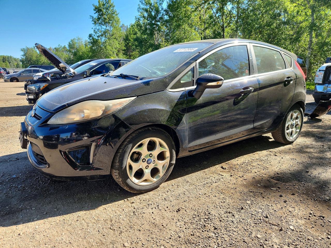 2012 Ford Fiesta SES, VIN 3FADP4FJXCM122652 — Rear end
